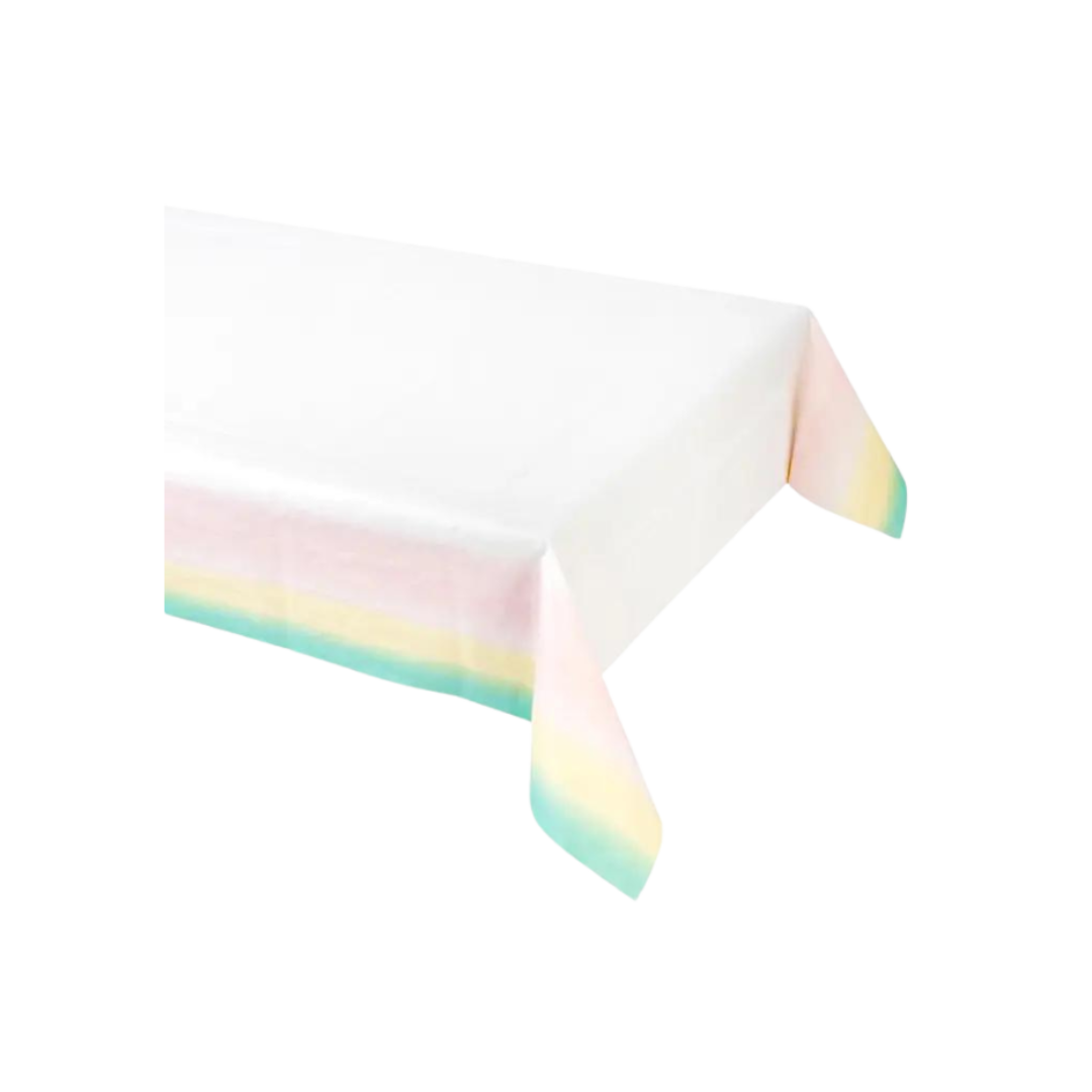 Pastel rainbow table cover with white center for birthday celebration from Parte Haus party supply store in Bethesda MD