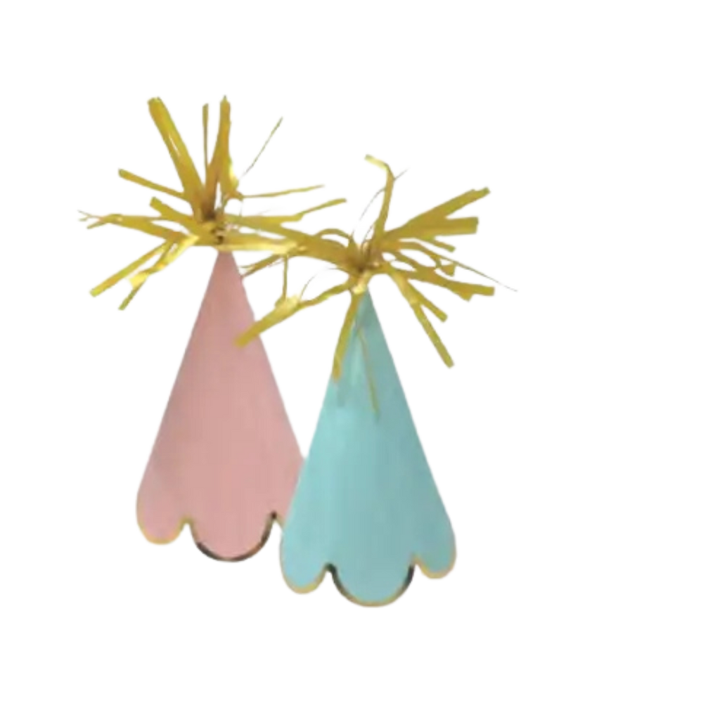 Pink and blue cone hats with gold fringe for birthday celebrations from Parte Haus party supply store in Bethesda MD