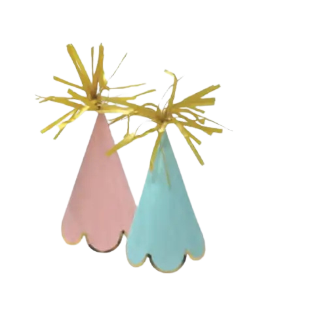 Pink and blue cone hats with gold fringe for birthday celebrations from Parte Haus party supply store in Bethesda MD