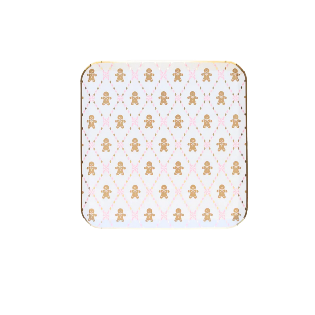 White gingerbread man plate with pink bows Christmas theme from Parte Haus party supply store in Bethesda MD