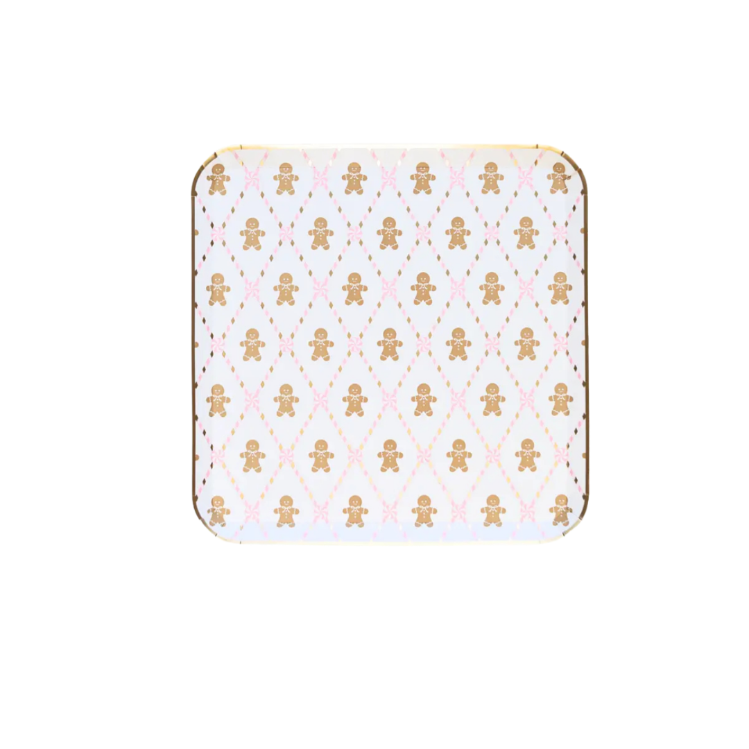 White gingerbread man plate with pink bows Christmas theme from Parte Haus party supply store in Bethesda MD
