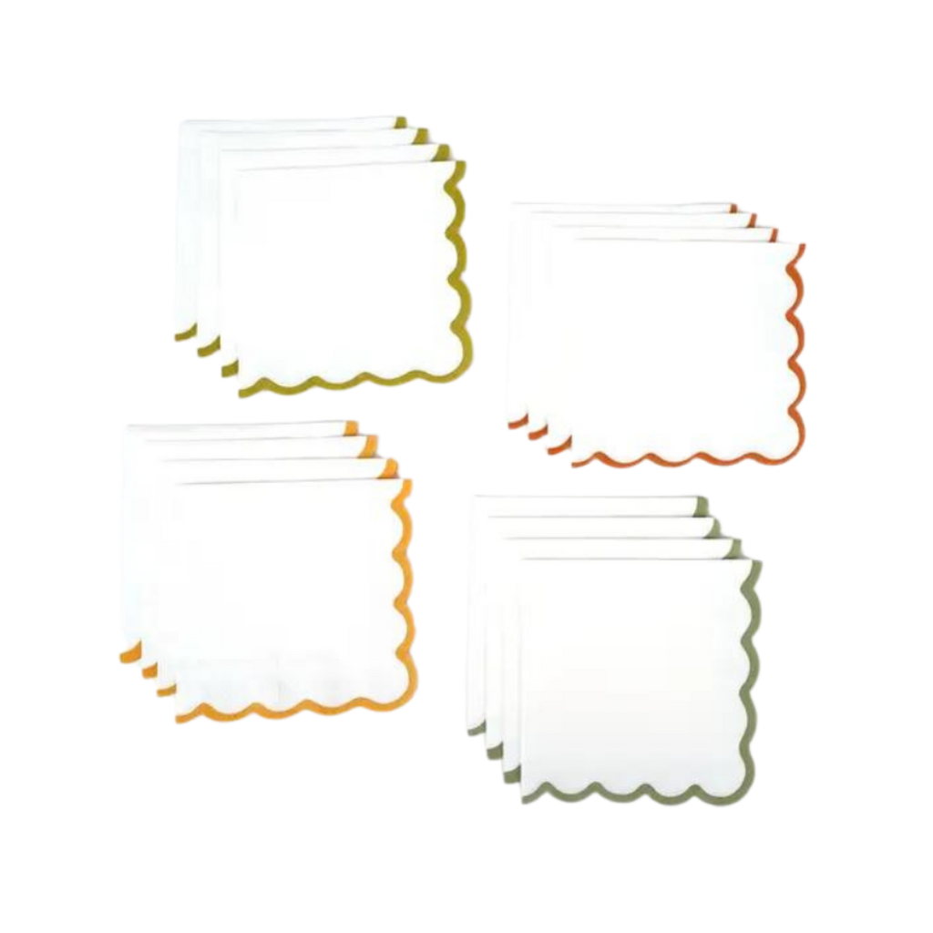 White scalloped edge napkins with gold orange and green trim for birthday from Parte Haus party supply store in Bethesda Maryland