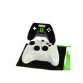 Black and white gaming controller cake with topper birthday theme from Parte Haus party supply store in Bethesda MD