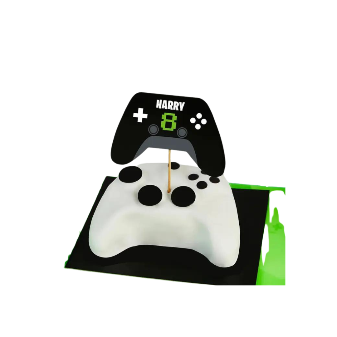 Black and white gaming controller cake with topper birthday theme from Parte Haus party supply store in Bethesda MD