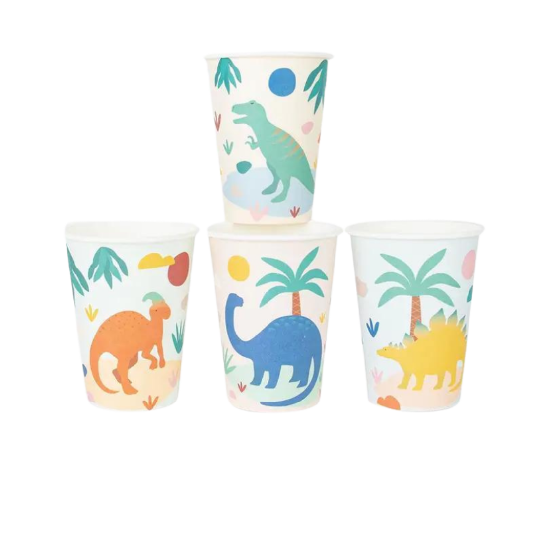 Multicolor dinosaur paper cups with playful dino and palm tree illustrations dinosaur birthday from Parte Haus party supply store in Bethesda MD