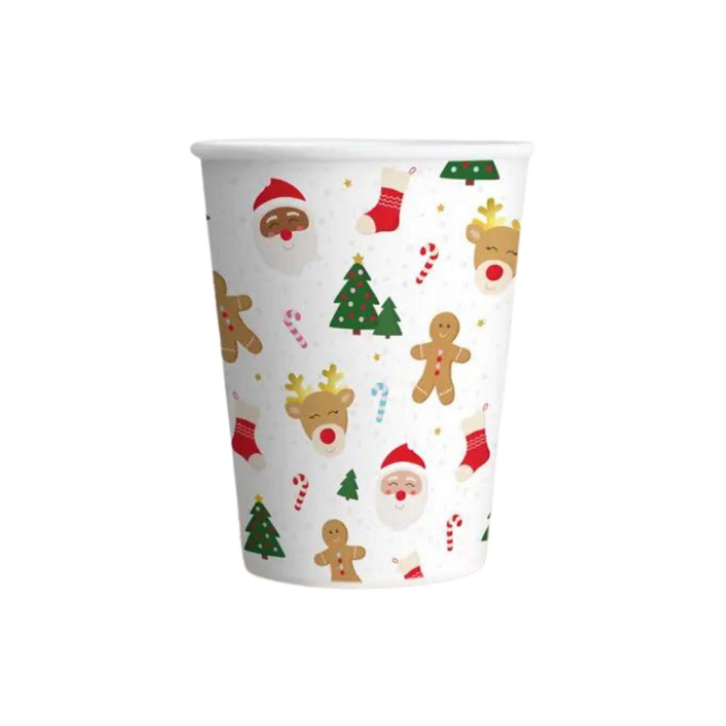 White Christmas paper cup with festive designs trees Santa and gingerbread from Parte Haus party supply store in Bethesda MD.