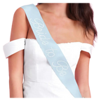 Light blue bride to be sash with white rhinestone letters for bridal shower from Parte Haus party supply store in Bethesda MD