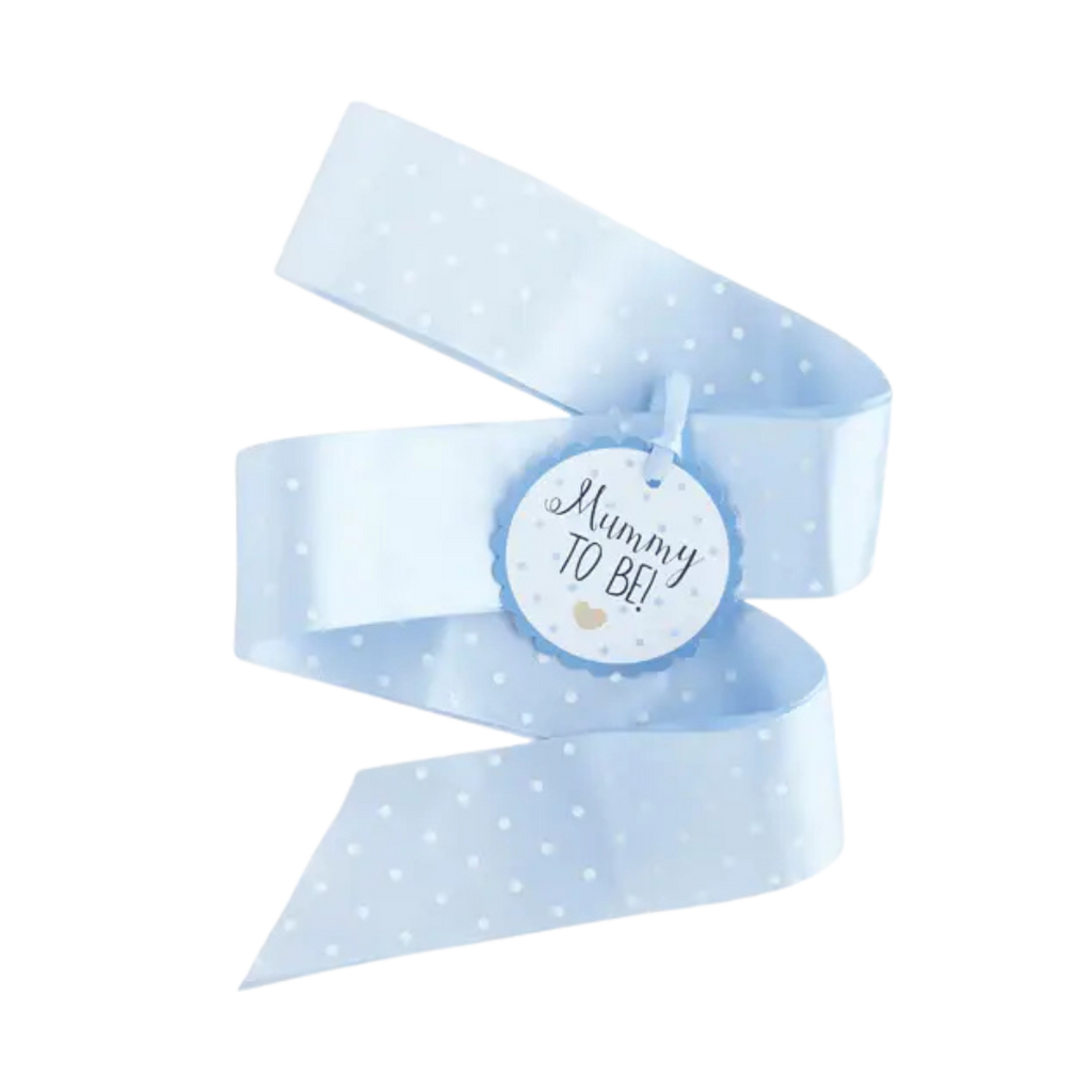 Light blue badge sash with white polka dots for baby shower from Parte Haus party supply store in Bethesda MD.