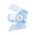 Light blue badge sash with white polka dots for baby shower from Parte Haus party supply store in Bethesda MD.