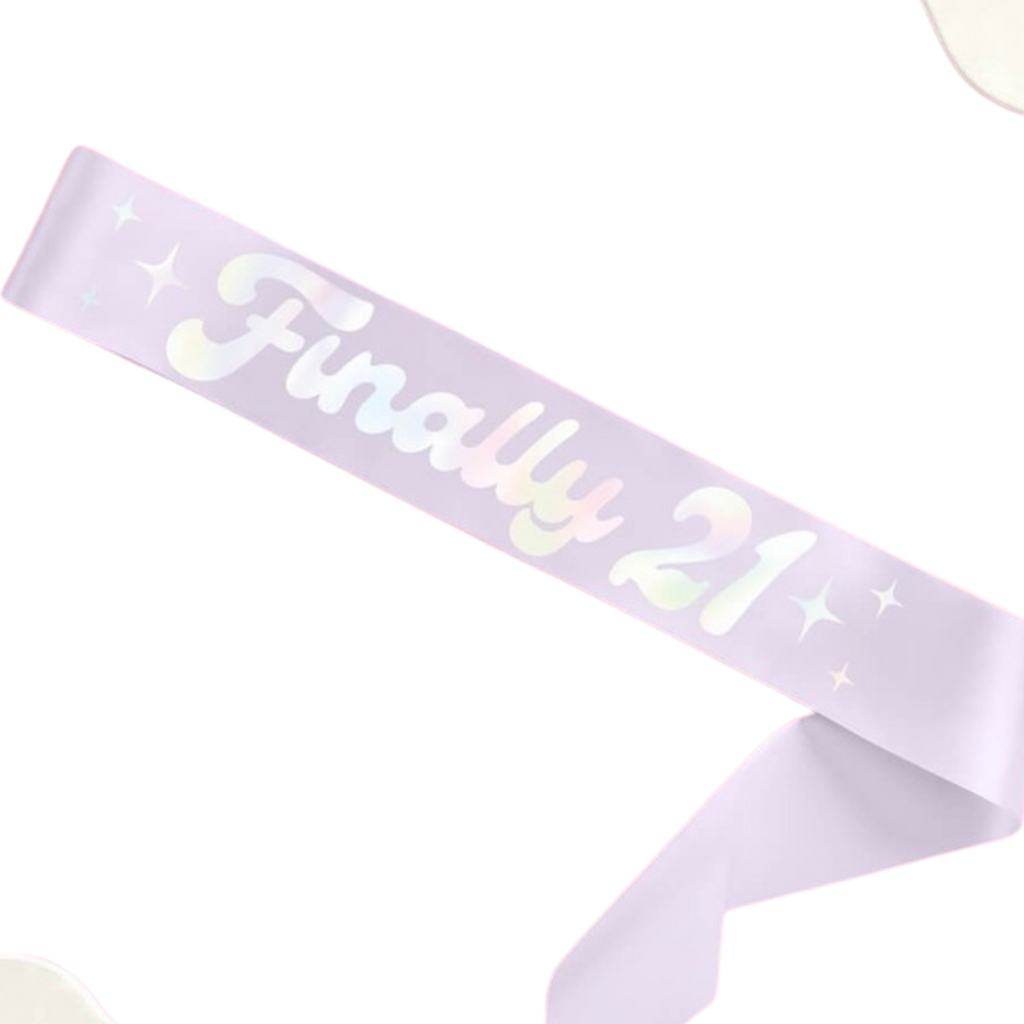 Pastel lavender sash with Finally 21 lettering birthday accessory from Parte Haus party supply store in Bethesda MD.