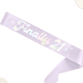 Pastel lavender sash with Finally 21 lettering birthday accessory from Parte Haus party supply store in Bethesda MD.