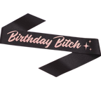 Black birthday sash with pink script and stars for birthday celebration from Parte Haus party supply store in Bethesda MD