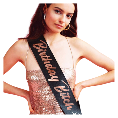 Black birthday sash with gold lettering worn by woman for birthday celebration from Parte Haus party supply store in Bethesda MD