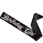 Black birthday girl sash with white script text birthday celebration from Parte Haus party supply store in Bethesda MD