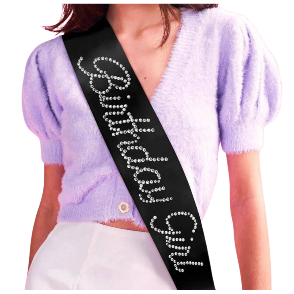 Black rhinestone birthday girl sash on woman birthday celebration from Parte Haus party supply store in Bethesda MD