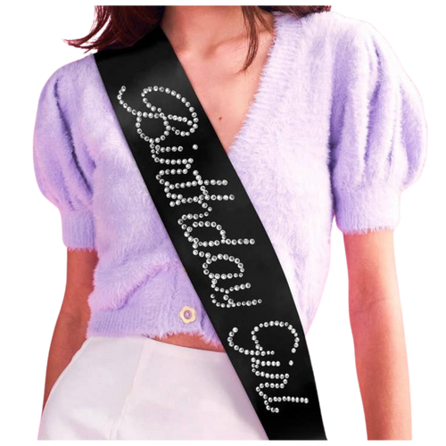 Black rhinestone birthday girl sash on woman birthday celebration from Parte Haus party supply store in Bethesda MD