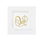 Gold and white napkin with One script for first birthday from Parte Haus party supply store in Bethesda MD