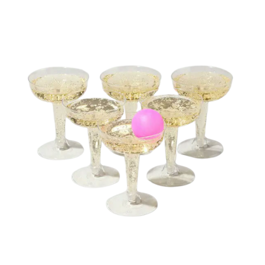 Clear plastic champagne cups set with a pink ball for celebration game from Parte Haus party supply store in Bethesda MD