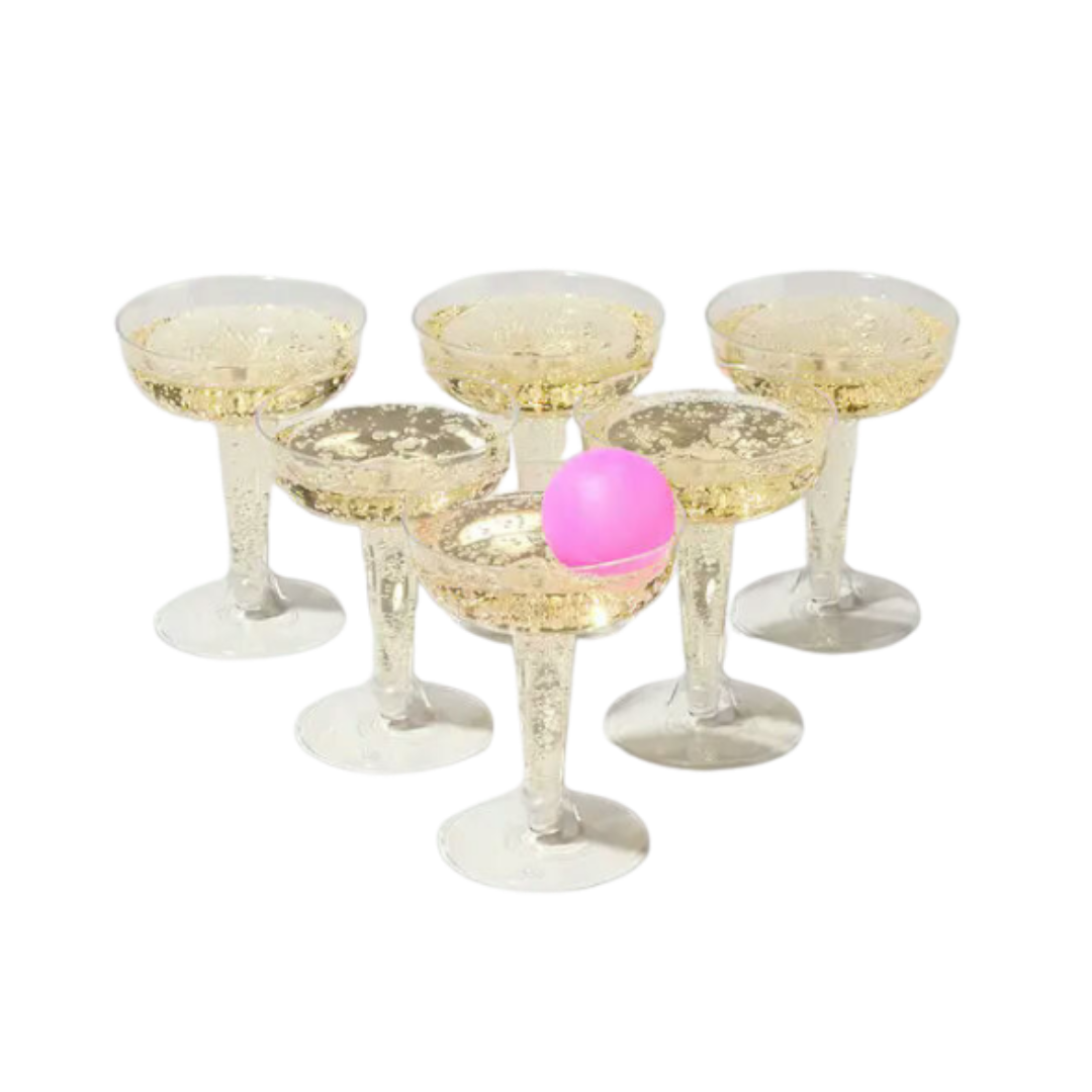 Clear plastic champagne cups set with a pink ball for celebration game from Parte Haus party supply store in Bethesda MD