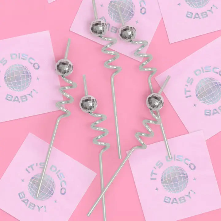 Silver reusable disco ball swirly straws on pink background bachelorette disco theme from Parte Haus party supply store in Bethesda Maryland