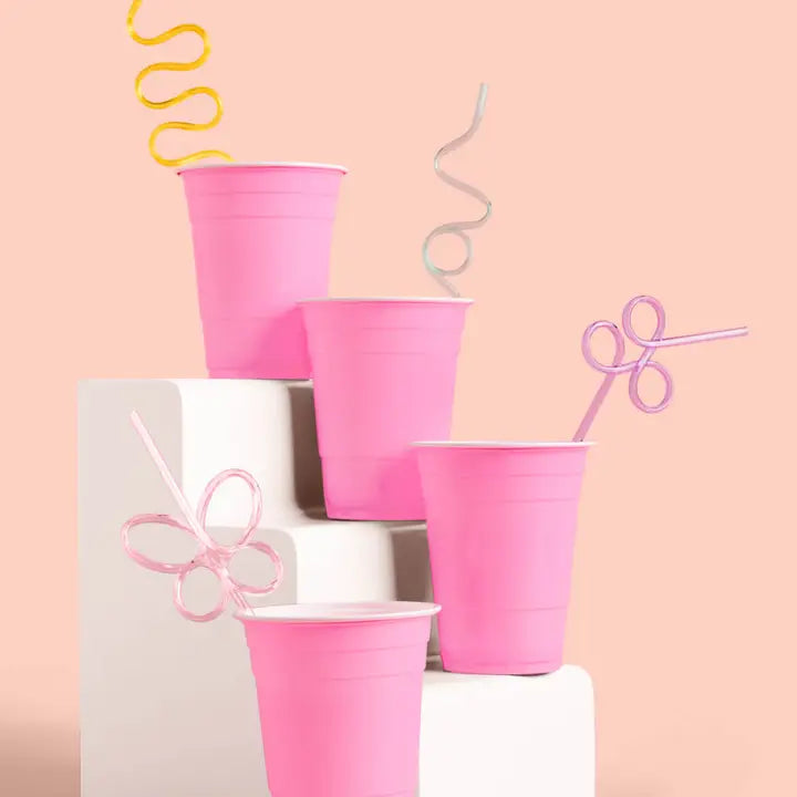 Pastel reusable swirly straws in pink cups for garden party from Parte Haus party supply store in Bethesda MD