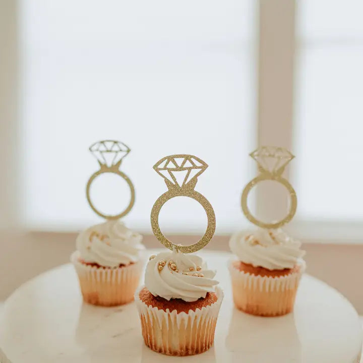 Gold diamond ring cupcake toppers on frosted cupcakes bridal shower decor from Parte Haus party supply store in Bethesda MD.