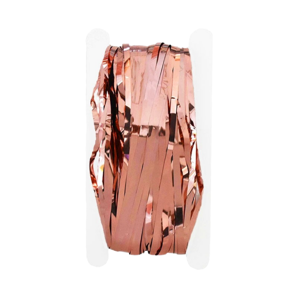 Rose gold fringe tinsel curtain backdrop shiny metallic streamers for celebrations from Parte Haus party supply store in Bethesda MD