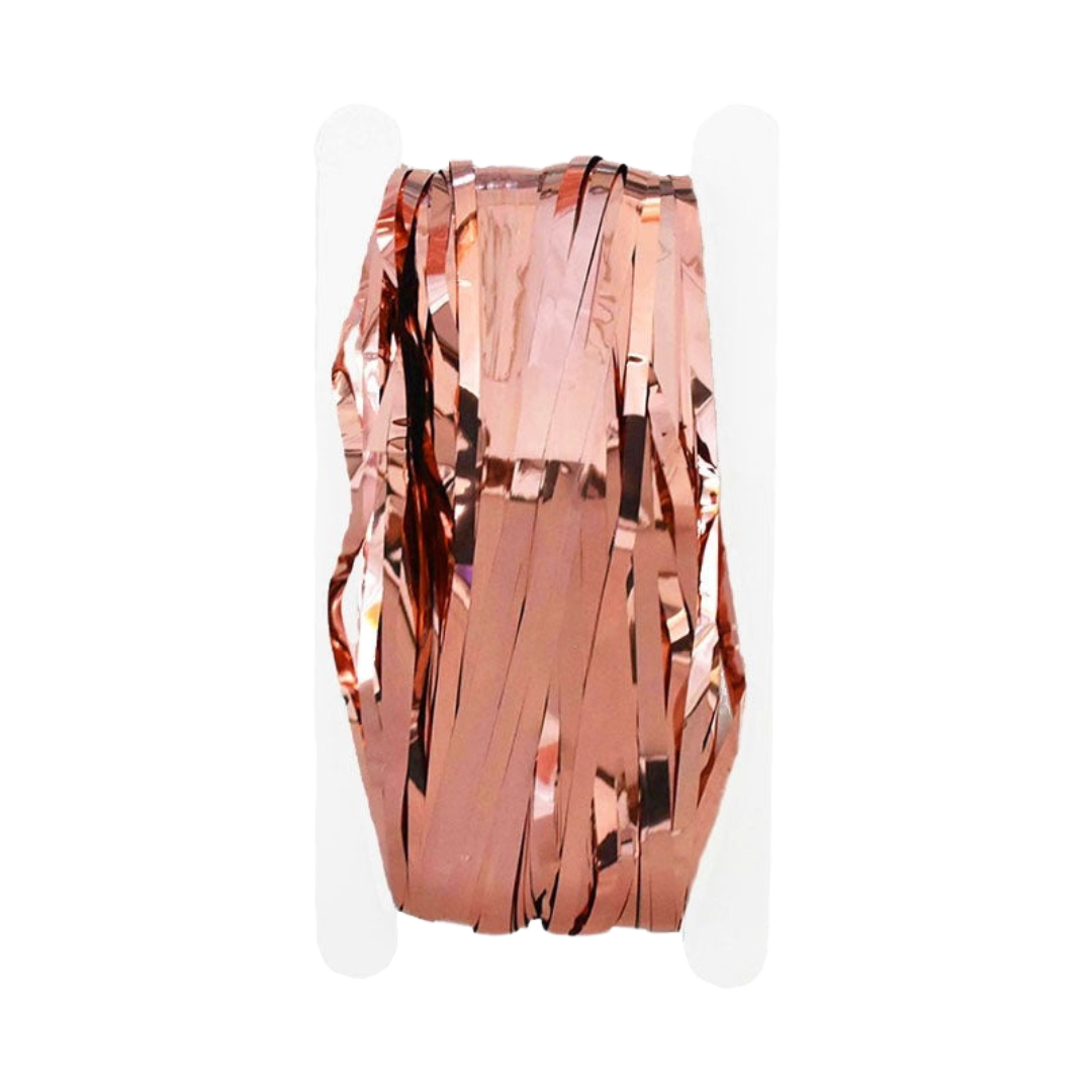 Rose gold fringe tinsel curtain backdrop shiny metallic streamers for celebrations from Parte Haus party supply store in Bethesda MD