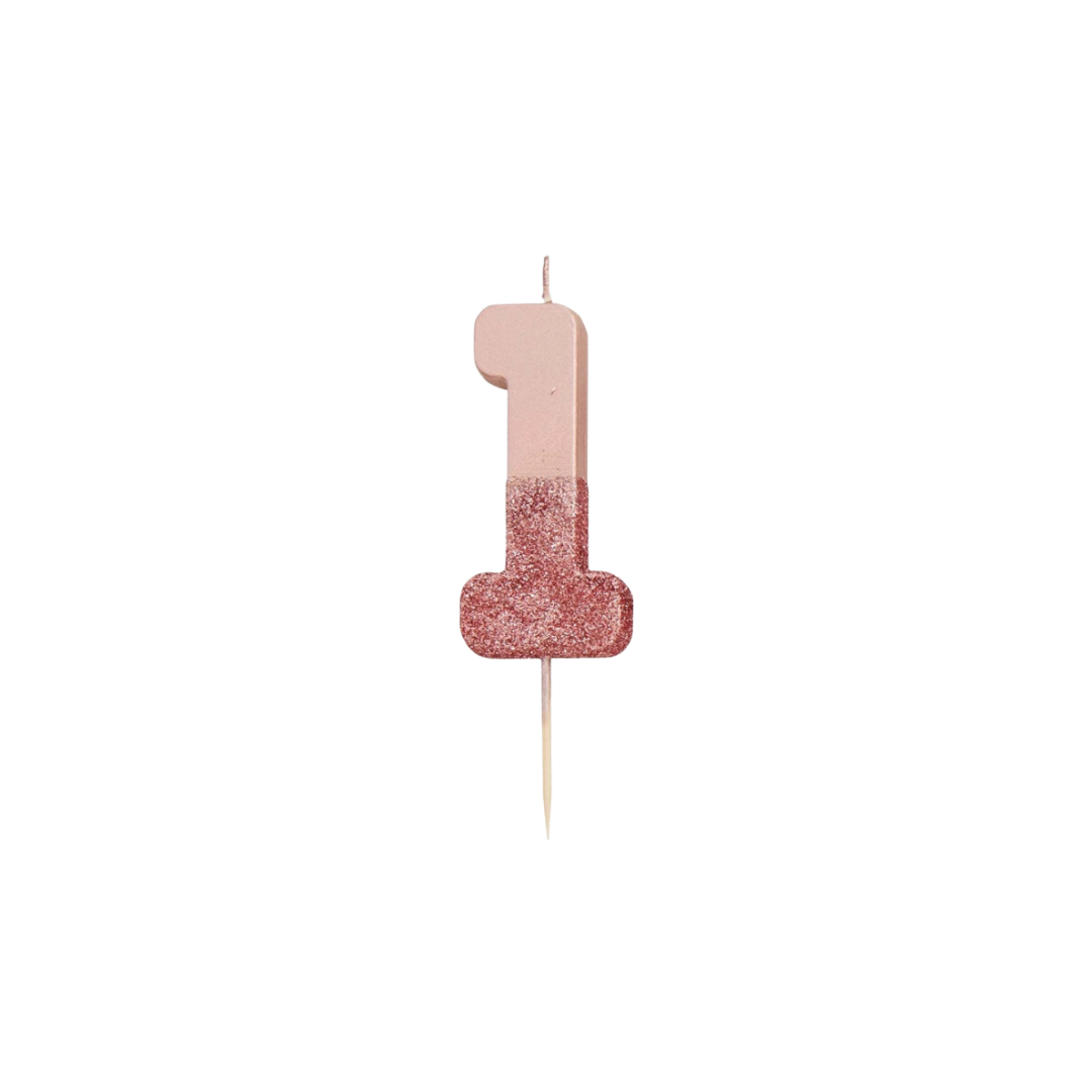 Rose gold glitter number candle shaped as one for birthday from Parte Haus party supply store in Bethesda Maryland