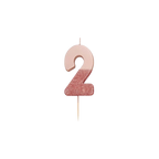 Rose gold glitter number candle shaped like a 2 birthday theme from Parte Haus party supply store in Bethesda Maryland