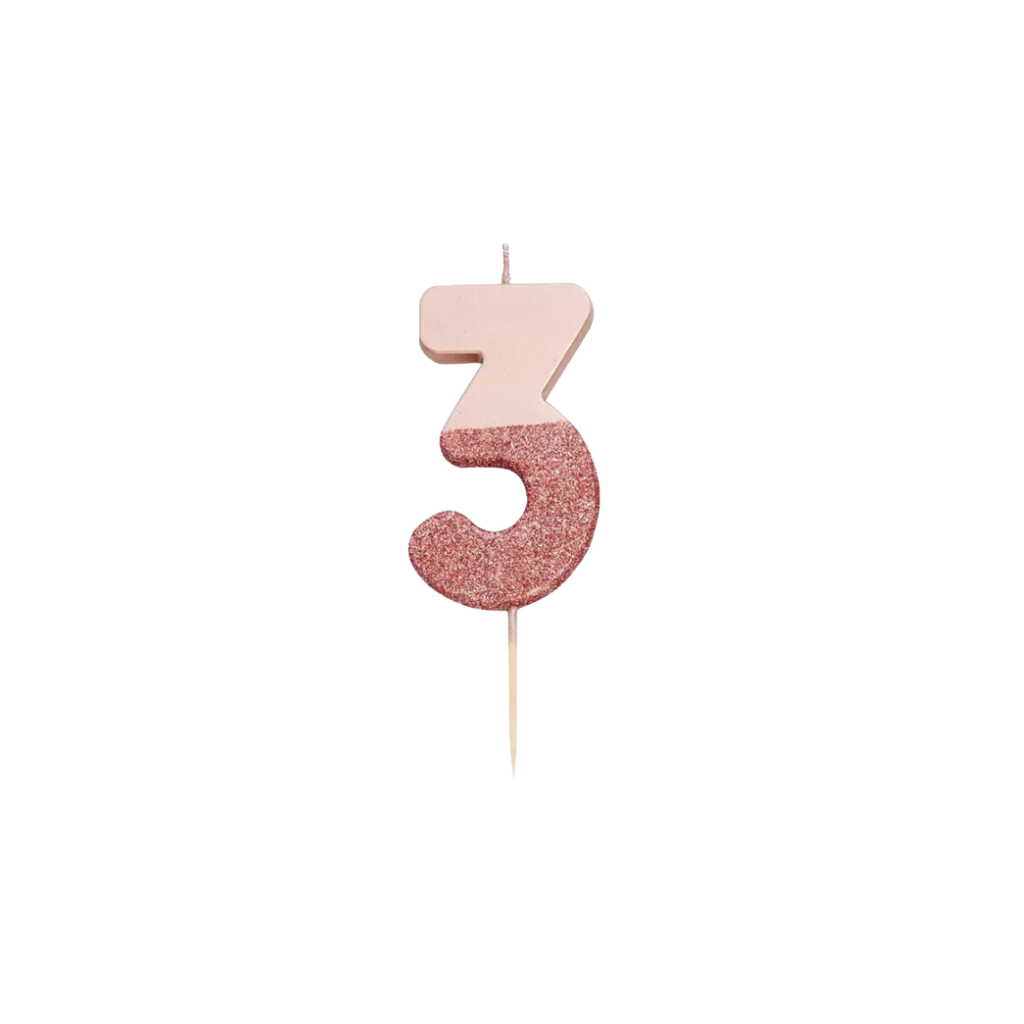 Rose gold glitter number 3 candle for birthday celebrations from Parte Haus party supply store in Bethesda MD