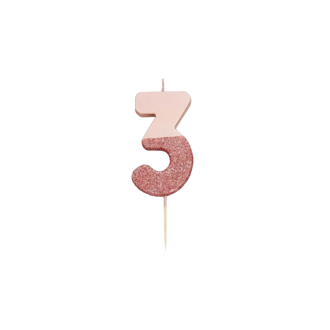 Rose gold glitter number 3 candle for birthday celebrations from Parte Haus party supply store in Bethesda MD