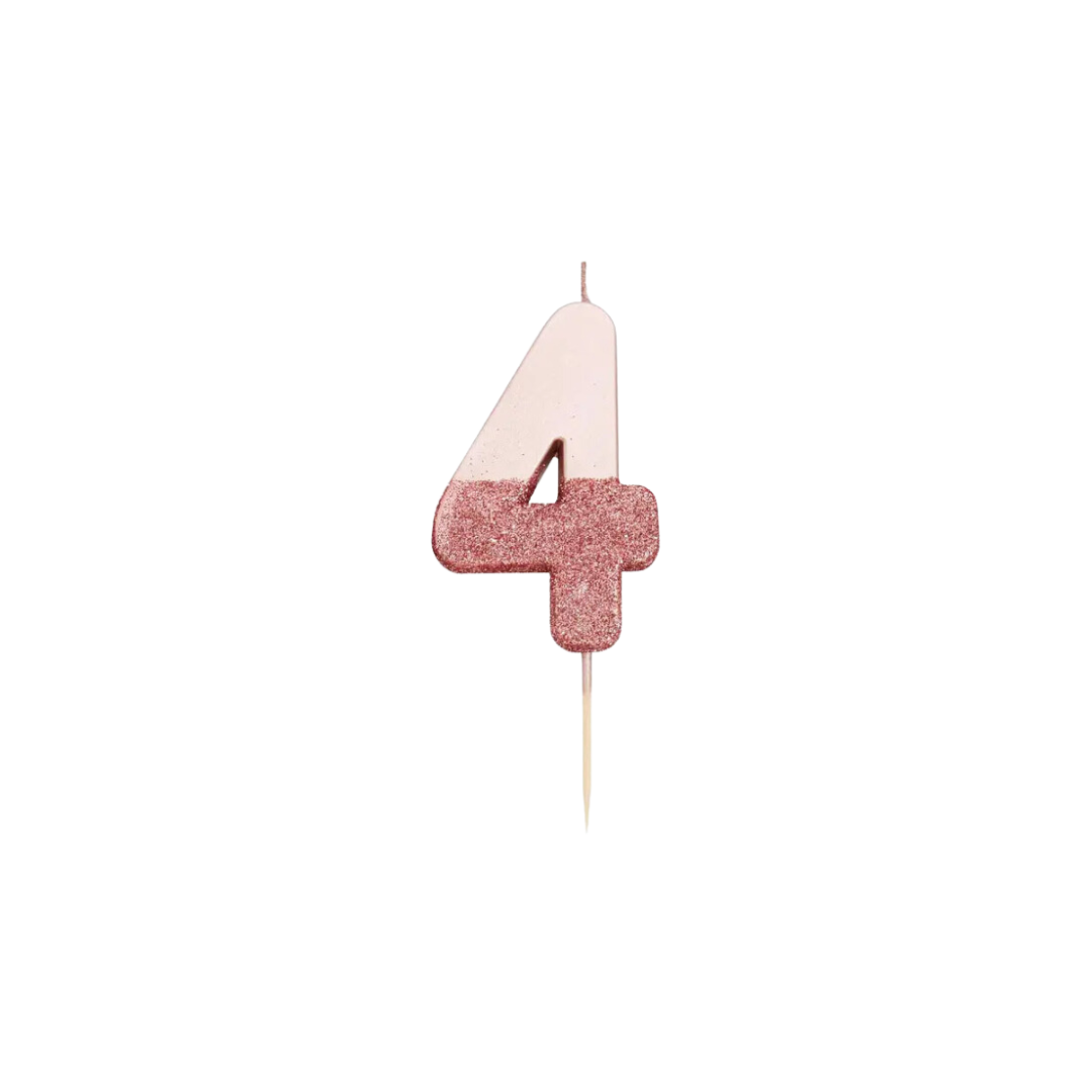 Rose gold glitter number 4 candle for birthday from Parte Haus party supply store in Bethesda MD