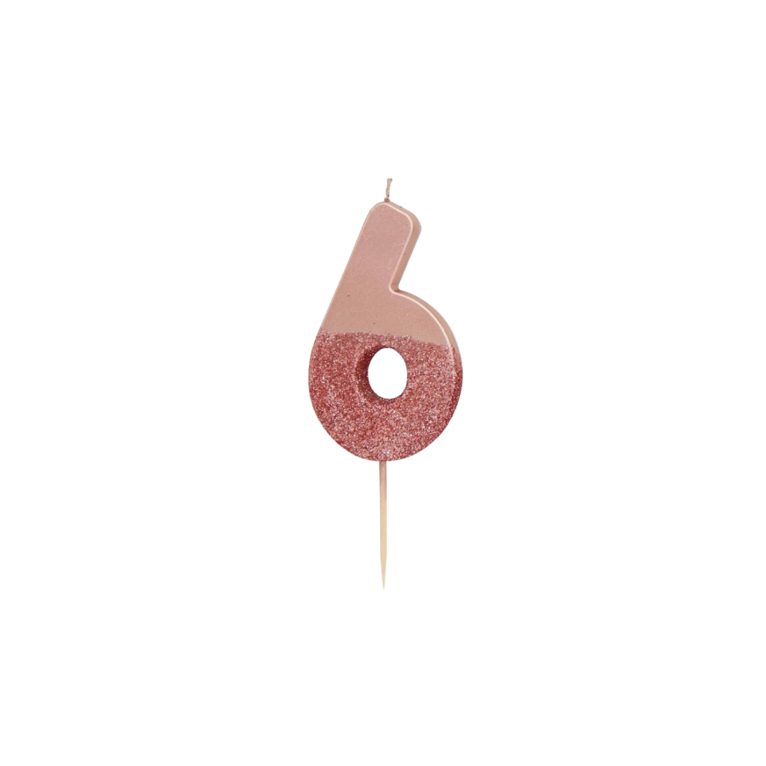 Rose gold glitter number candle shaped like 6 for birthday from Parte Haus party supply store in Bethesda MD