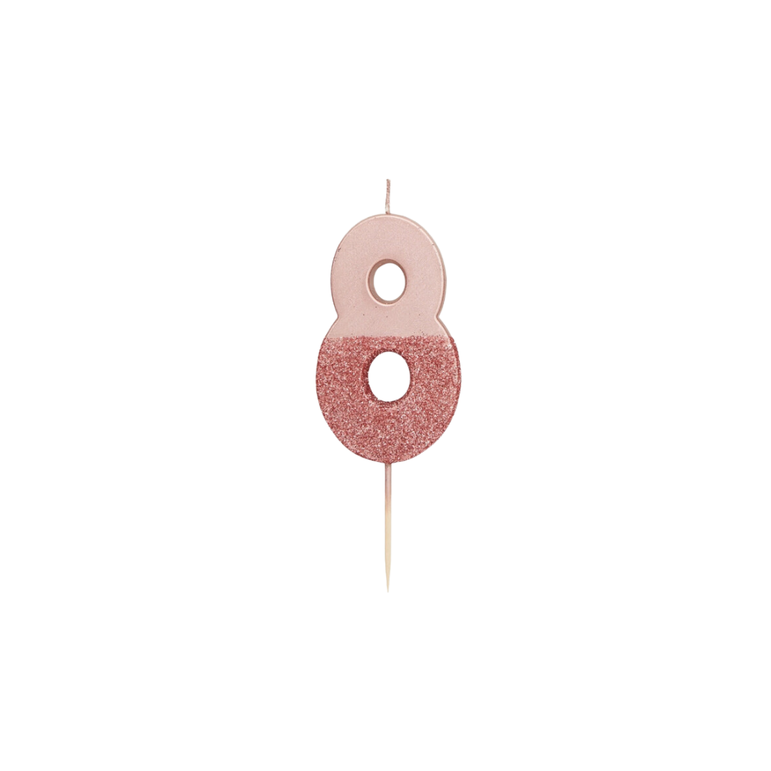 Rose gold glitter number candle shaped like 8 birthday theme from Parte Haus party supply store in Bethesda, MD