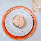 Rose gold dinner plates with polka dots for birthday or celebration from Parte Haus party supply store in Bethesda MD