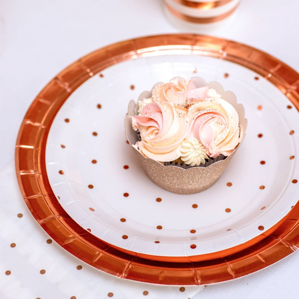 Rose gold dinner plate with polka dots elegant dessert tableware for birthdays from Parte Haus party supply store in Bethesda MD