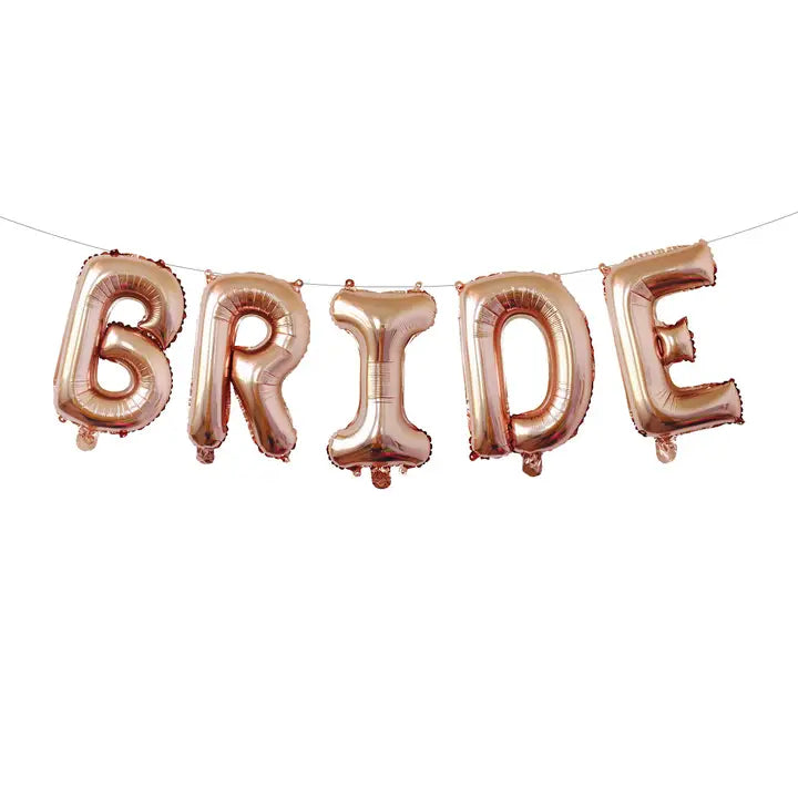 Rose gold balloon letter banner spelling bride bridal shower decoration from Parte Haus party supply store in Bethesda Maryland