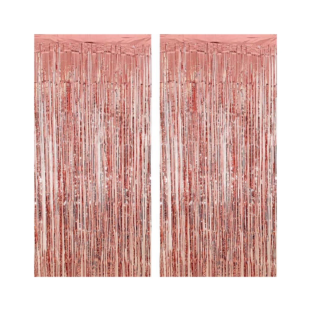 Rose gold fringe tinsel curtain backdrop for celebrations from Parte Haus party supply store in Bethesda MD