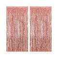 Rose gold fringe tinsel curtain backdrop for celebrations from Parte Haus party supply store in Bethesda MD