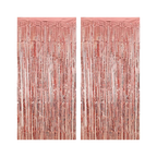 Rose gold fringe tinsel curtain backdrop for celebrations from Parte Haus party supply store in Bethesda MD
