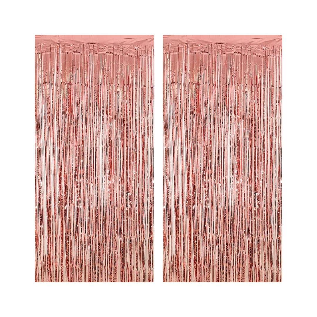 Rose gold fringe tinsel curtain backdrop for celebrations from Parte Haus party supply store in Bethesda MD