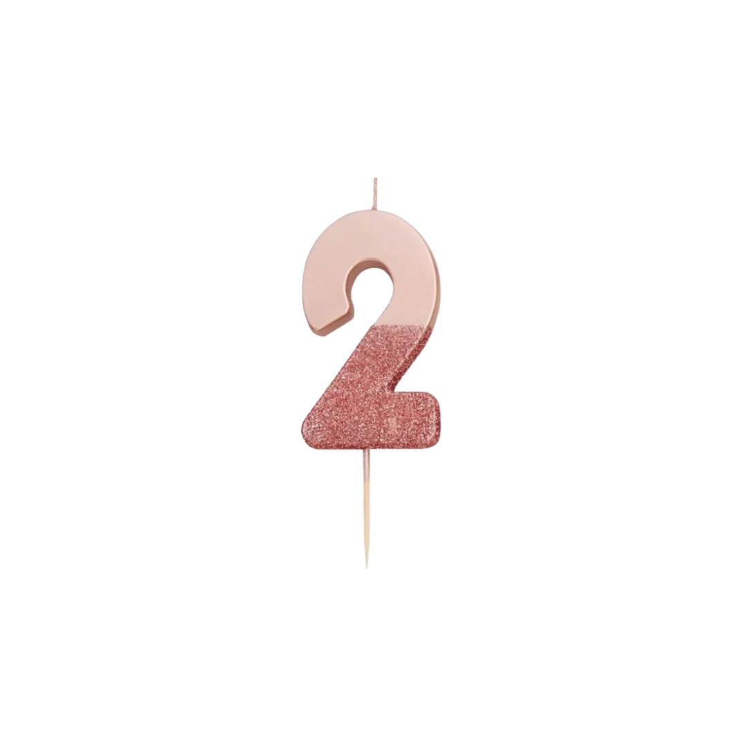 Rose gold glitter number candle two for birthdays from Parte Haus party supply store in Bethesda Maryland
