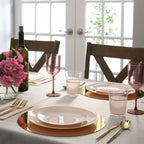 Blush gold plastic plates elegant dinner table setting for celebration from Parte Haus party supply store in Bethesda Maryland