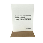 White humorous new baby card featuring bold black text from Parte Haus party supply store in Bethesda Maryland