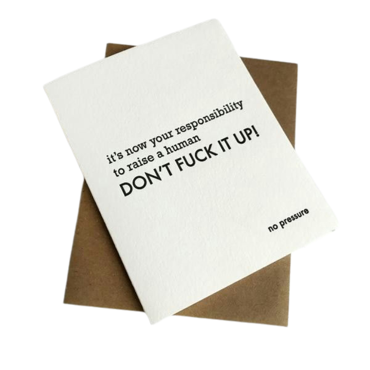White and kraft brown humorous greeting card with bold text for baby shower from Parte Haus party supply store in Bethesda MD.
