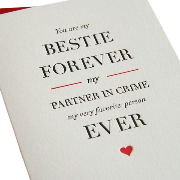 White friendship greeting card with black and red text and a small heart for best friends from Parte Haus party supply store in Bethesda MD.