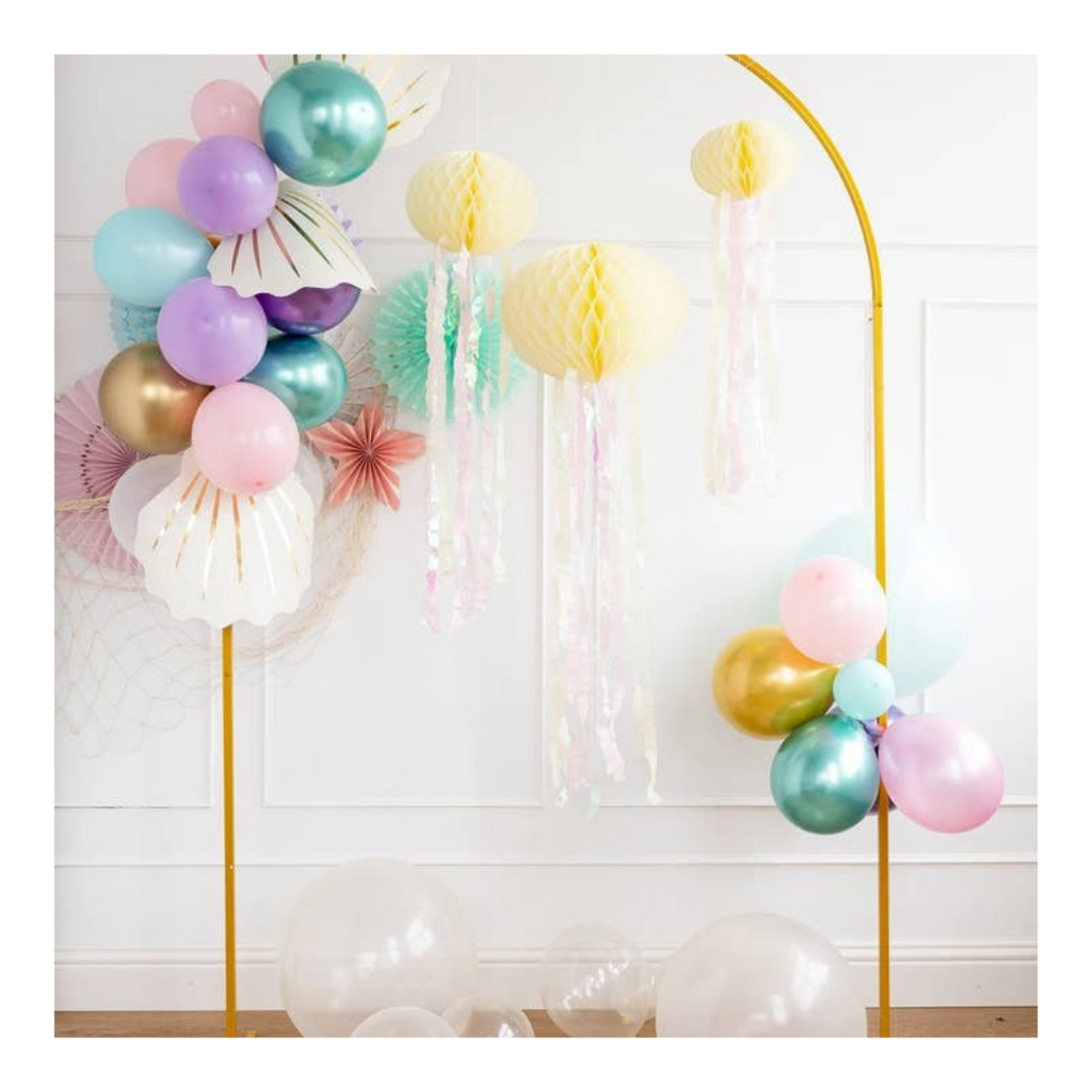 Pastel and gold balloon arch with honeycomb lanterns for birthday theme from Parte Haus party supply store in Bethesda Maryland