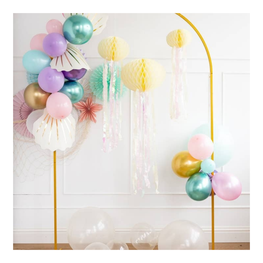 Pastel and gold balloon arch with honeycomb lanterns for birthday theme from Parte Haus party supply store in Bethesda Maryland
