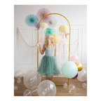 Mint dress girl standing with pastel balloons and fans for birthday from Parte Haus party supply store in Bethesda MD